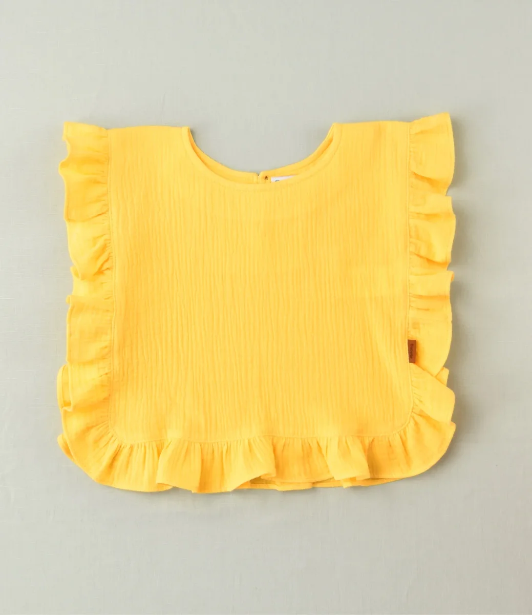 Camiseta lisa con volante amarilla niña