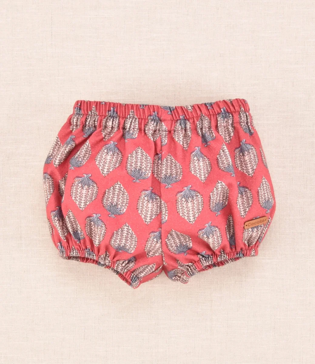 Braguita bebé estampada burdeos con volante elástico