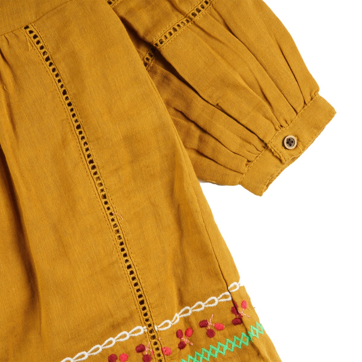 Vestido niña mostaza bambula bordado con borlas - Imagen 5