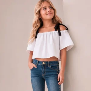 Blusa niña blanca con lazos negros