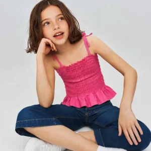 Camiseta niña fucsia con lazos