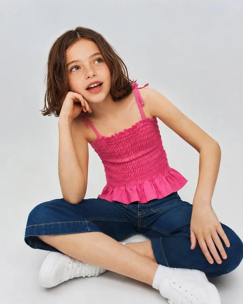 Camiseta niña fucsia con lazos
