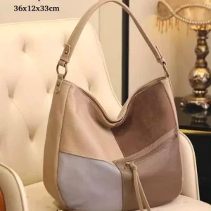 Amplio Bolso de Hombro Sintético Multicolor tipo Hobo con Bolsillos Exteriores para Mujer