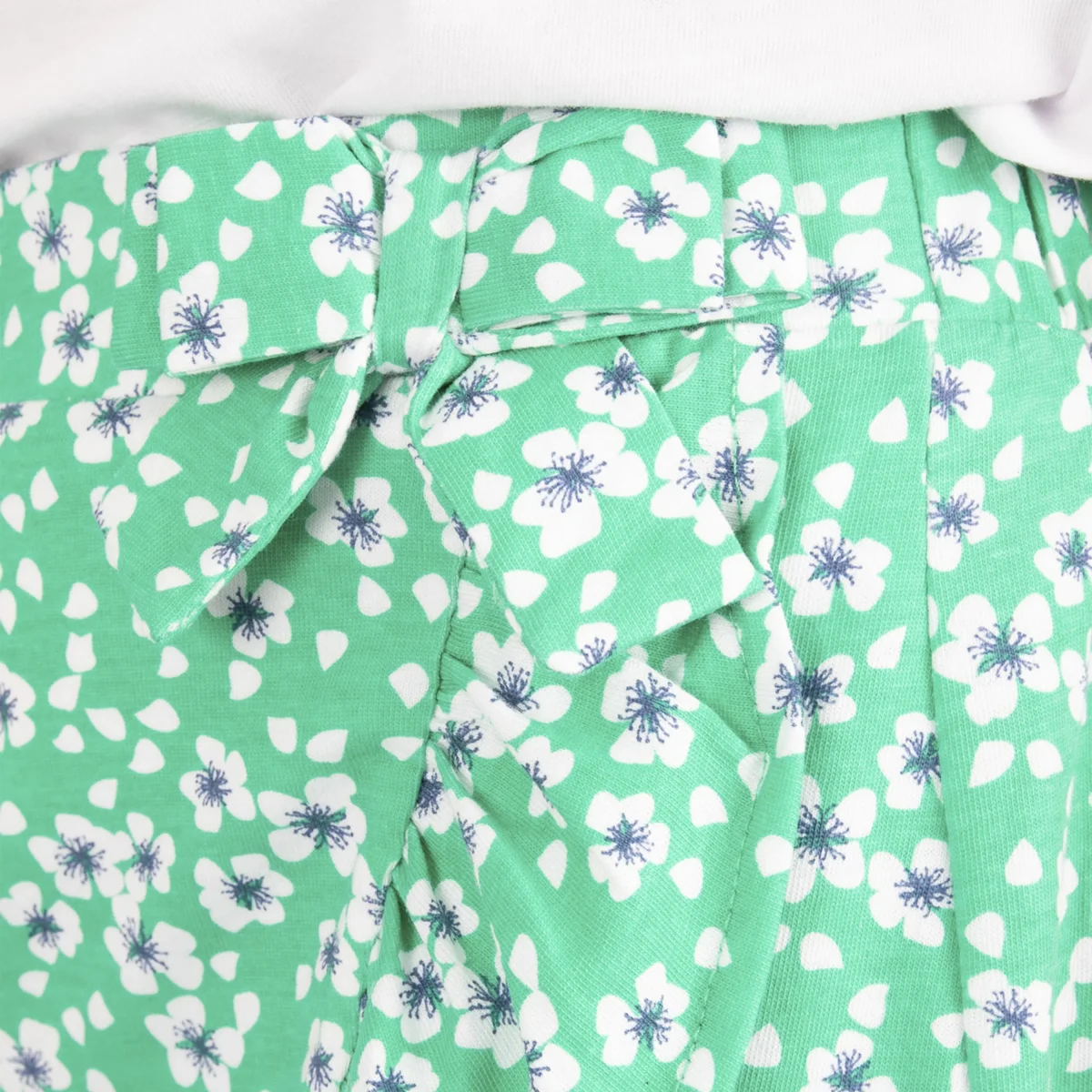 Falda niña verde floral con volante