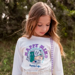 Camiseta manga larga de niña en color crudo y dibujo morado